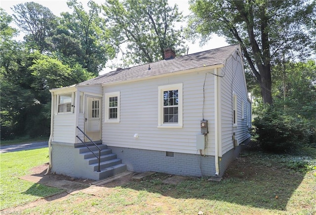 2904 Spring Garden St, Greensboro, NC 27403 - bungalow with entry steps, crawl space, a front yard, and a chimney