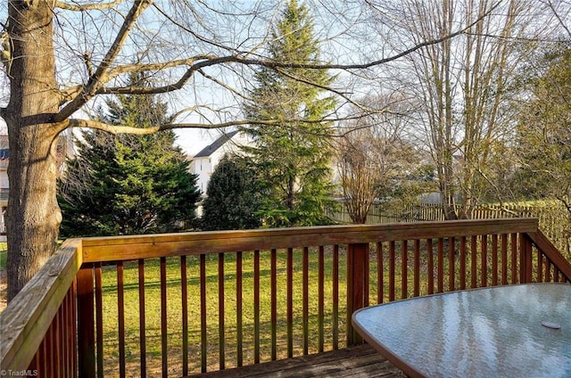 deck featuring a yard