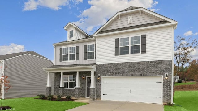 2867 Burgess Dr, Mebane, NC 27302 - craftsman-style house with brick siding, concrete driveway, a front lawn, and an attached garage