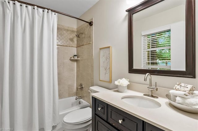 full bath featuring toilet, vanity, and shower / bathtub combination with curtain