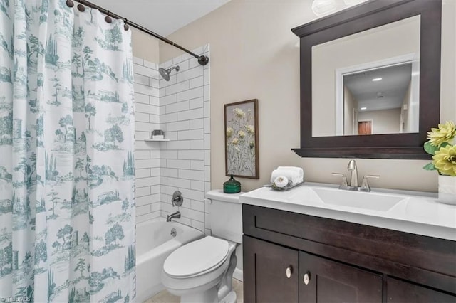bathroom with toilet, shower / bath combo with shower curtain, and vanity