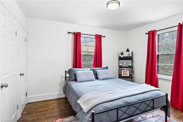 bedroom featuring dark hardwood / wood-style floors