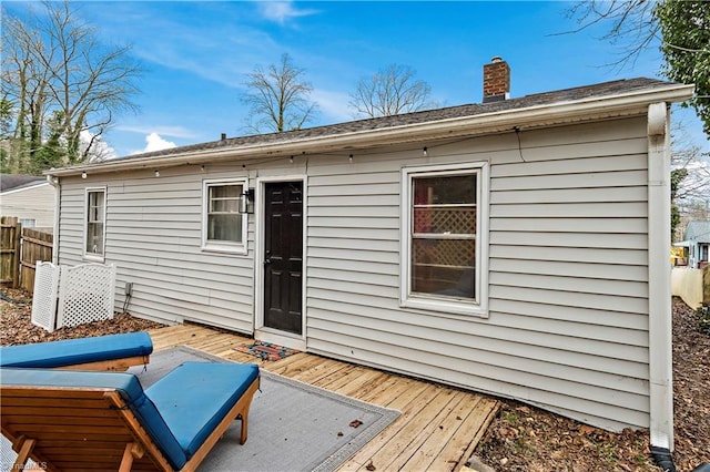 rear view of property with a deck