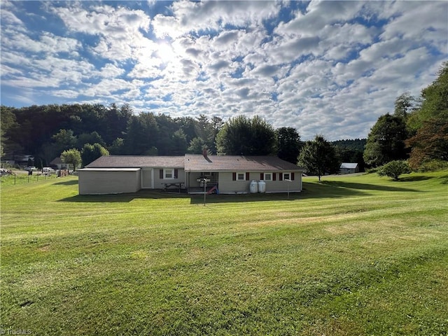 view of front of property with a front lawn