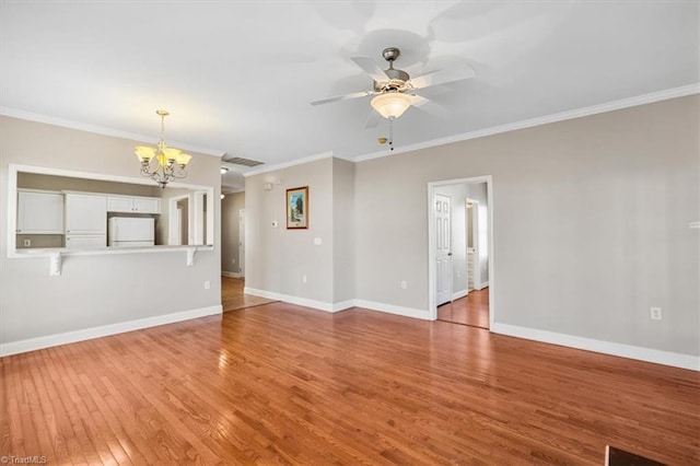 unfurnished living room with crown molding, ceiling fan with notable chandelier, and light hardwood / wood-style flooring