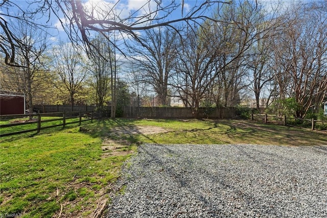view of yard featuring fence