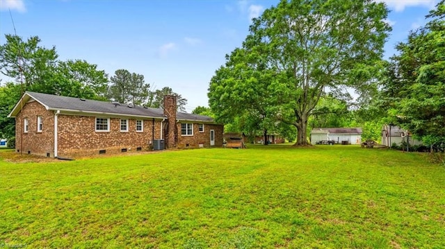 318 Sedalia Rd, Gibsonville, NC 27249 - view of green lawn featuring central air condition unit