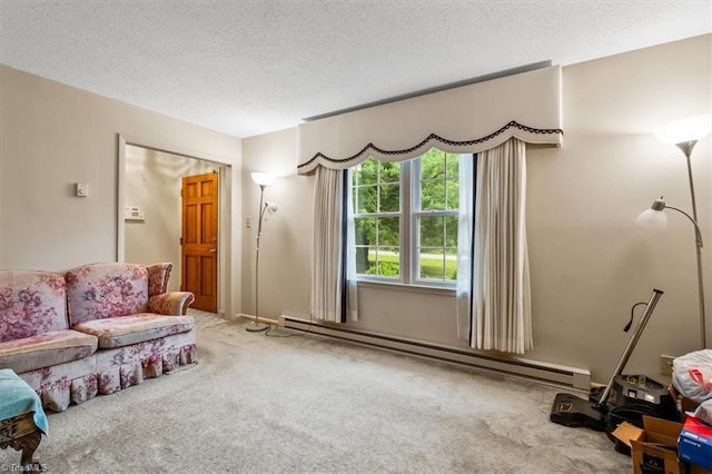 318 Sedalia Rd, Gibsonville, NC 27249 - carpeted living area with a baseboard radiator and a textured ceiling