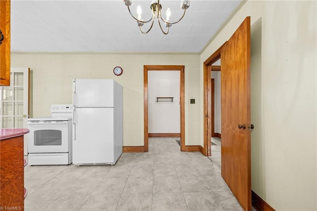 kitchen with hanging light fixtures, an inviting chandelier, crown molding, and white appliances