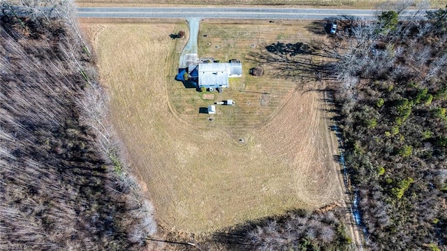 birds eye view of property featuring a rural view