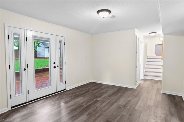 1022 Willowlake Rd, Winston-Salem, NC 27106 - foyer entrance with dark wood-type flooring, baseboards, stairs, and a textured ceiling