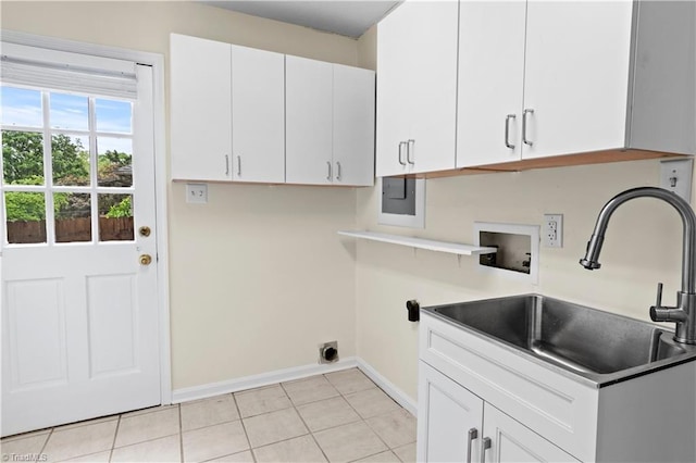 1022 Willowlake Rd, Winston-Salem, NC 27106 - laundry room featuring cabinet space, baseboards, hookup for a washing machine, and light tile patterned floors