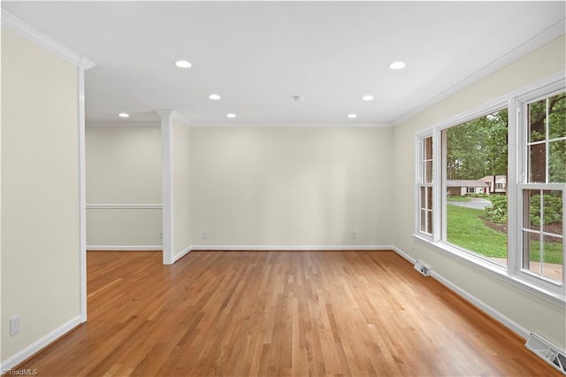 1022 Willowlake Rd, Winston-Salem, NC 27106 - unfurnished room featuring ornamental molding, baseboards, light wood finished floors, and recessed lighting