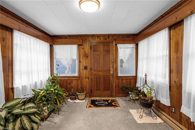 sunroom featuring a baseboard radiator