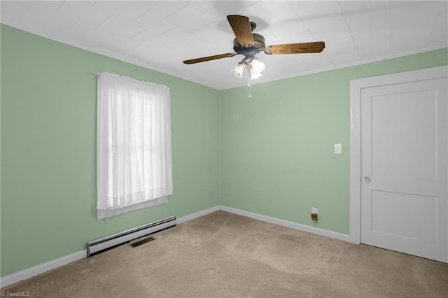 carpeted spare room featuring baseboard heating and ceiling fan