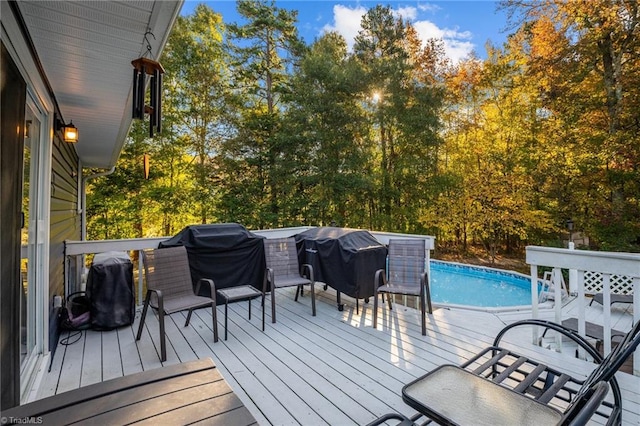 wooden deck with grilling area