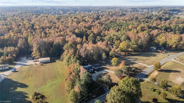 birds eye view of property featuring a rural view