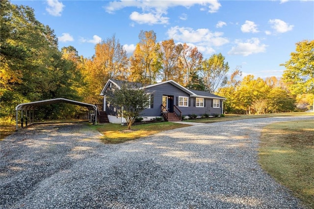 view of front of property with a carport