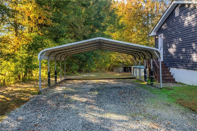 view of vehicle parking with a carport