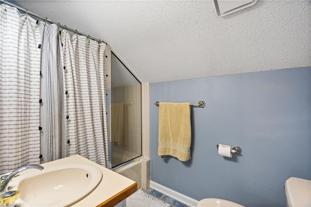 6404 Muirfield Dr, Greensboro, NC 27410 - bathroom featuring toilet, a textured ceiling, baseboards, vaulted ceiling, and shower / tub combo with curtain