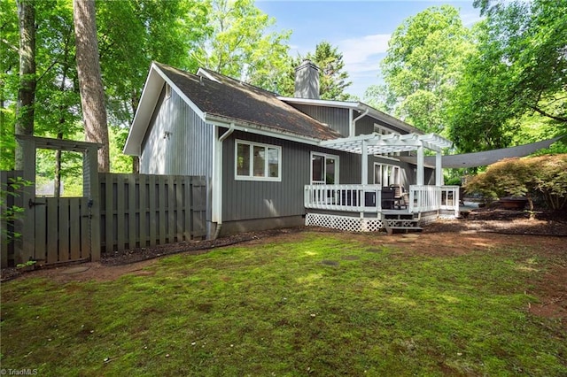 6404 Muirfield Dr, Greensboro, NC 27410 - back of house with a chimney, a pergola, and a wooden deck