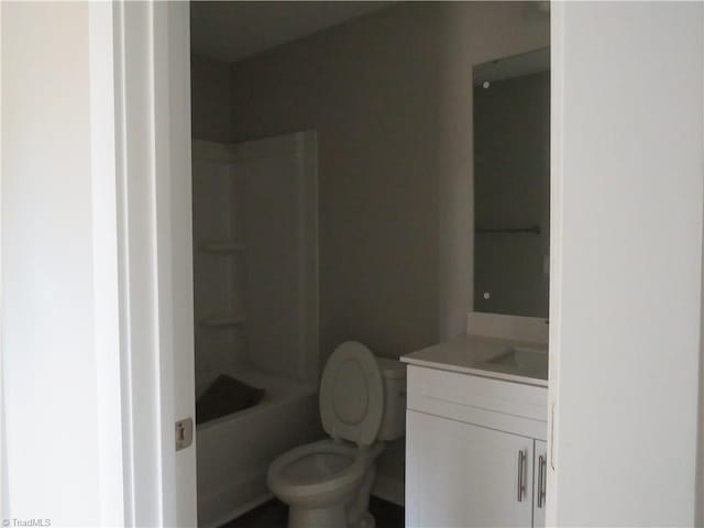 full bathroom featuring vanity, shower / tub combination, and toilet