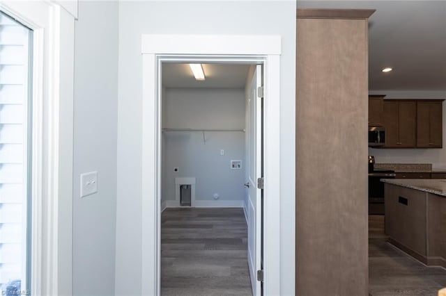 corridor featuring baseboards, dark wood-style flooring, and recessed lighting