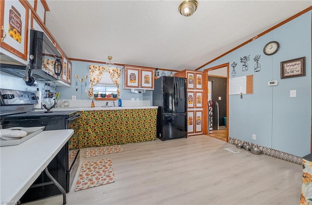 kitchen with lofted ceiling, black appliances, light hardwood / wood-style floors, a textured ceiling, and crown molding