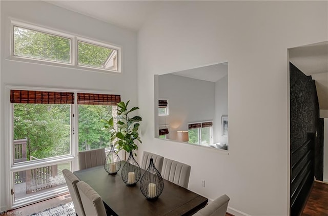 1935 Eastchester Dr Unit B, High Point, NC 27265 - dining area featuring wood finished floors and a towering ceiling