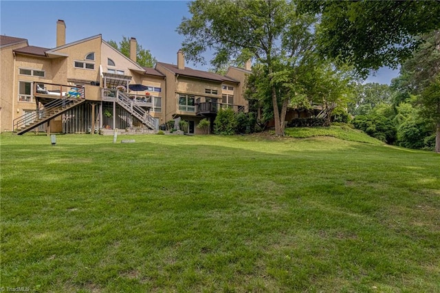 1935 Eastchester Dr Unit B, High Point, NC 27265 - view of green lawn with stairs and a wooden deck