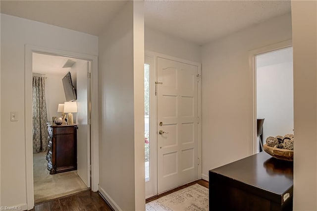 1935 Eastchester Dr Unit B, High Point, NC 27265 - foyer entrance featuring wood finished floors and baseboards