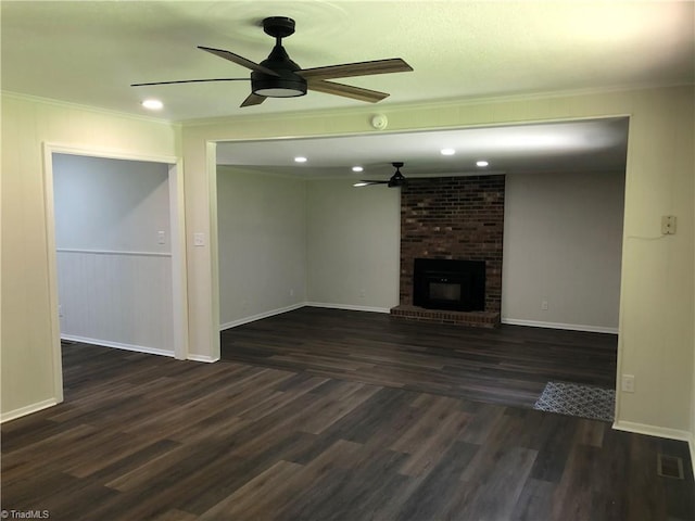 3960 Wards Gap, Cana, VA 24317 - unfurnished living room featuring ceiling fan, ornamental molding, dark wood finished floors, a fireplace, and baseboards