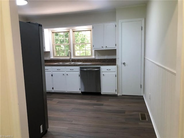3960 Wards Gap, Cana, VA 24317 - kitchen with stainless steel appliances, dark countertops, a sink, white cabinets, and dark wood-type flooring