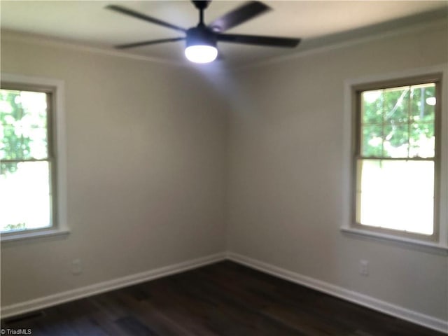 3960 Wards Gap, Cana, VA 24317 - empty room with a ceiling fan, crown molding, dark wood-style flooring, and baseboards