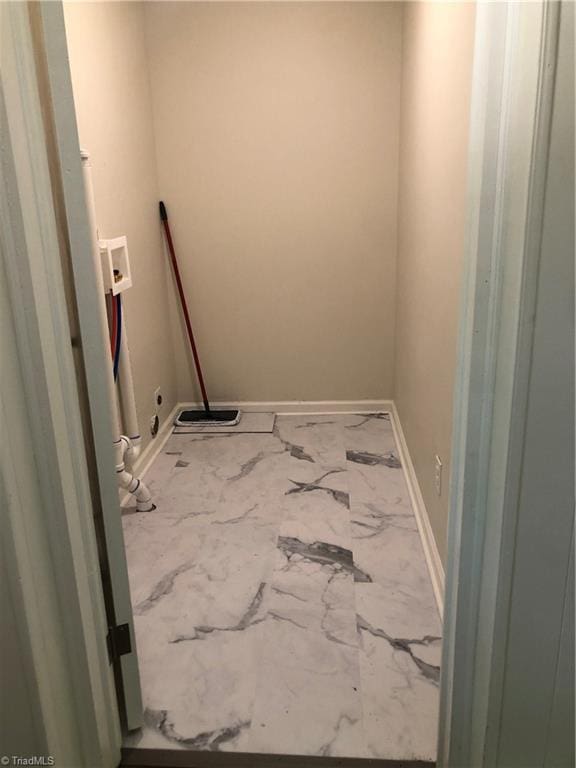 3960 Wards Gap, Cana, VA 24317 - laundry room featuring hookup for a washing machine, marble finish floors, and baseboards