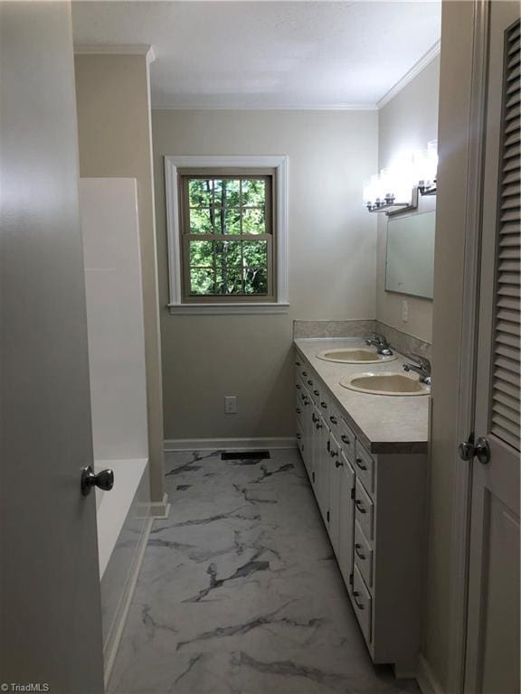 3960 Wards Gap, Cana, VA 24317 - bathroom with marble finish floors, crown molding, double vanity, baseboards, and a tub to relax in