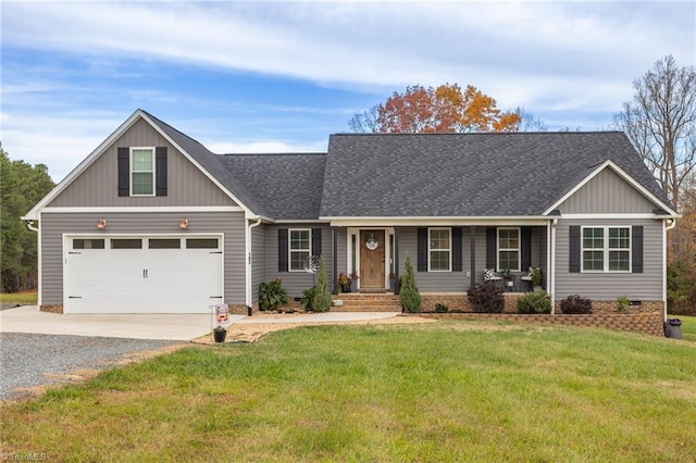 view of front of property with a front lawn and a garage