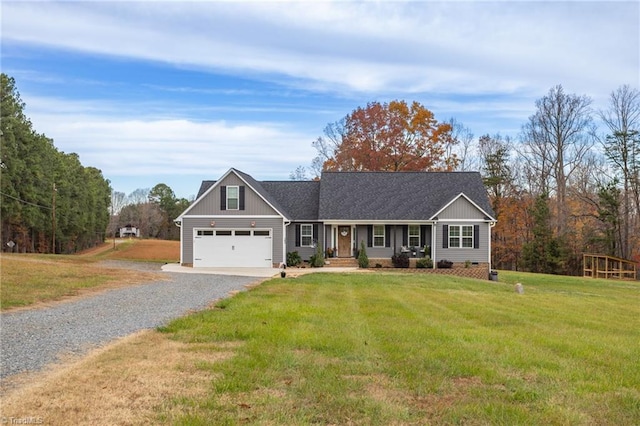 ranch-style house with a garage and a front yard