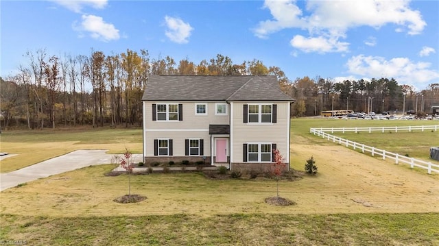 view of front of property with a front lawn