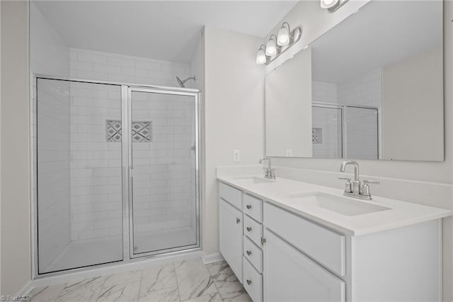 bathroom featuring vanity and an enclosed shower