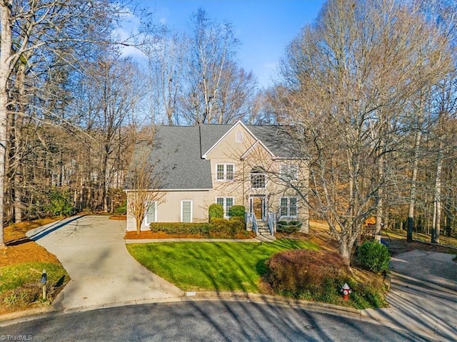 view of front of house with a front lawn