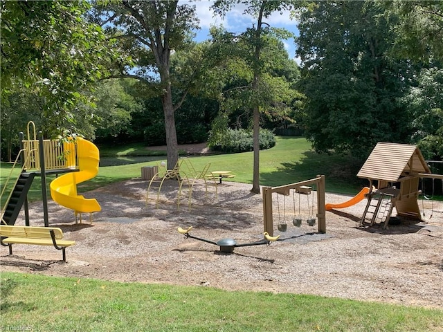 view of playground with a yard