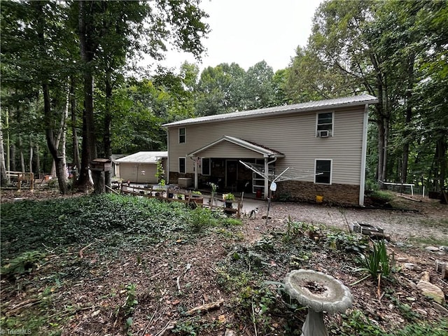 rear view of house with a patio