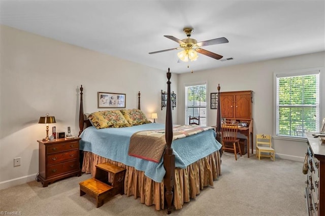2105 Rosemont Dr, Colfax, NC 27235 - bedroom with multiple windows, light colored carpet, baseboards, and a ceiling fan