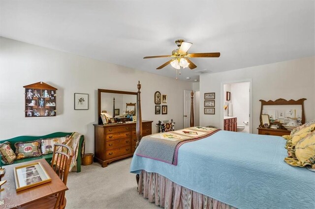 2105 Rosemont Dr, Colfax, NC 27235 - carpeted bedroom featuring ceiling fan and connected bathroom
