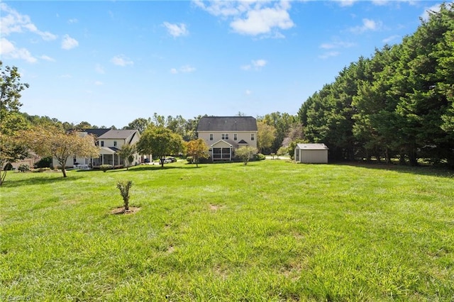 view of yard featuring a storage shed