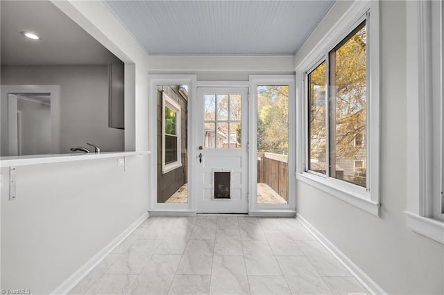 view of unfurnished sunroom