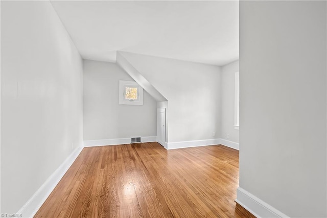 bonus room featuring hardwood / wood-style flooring