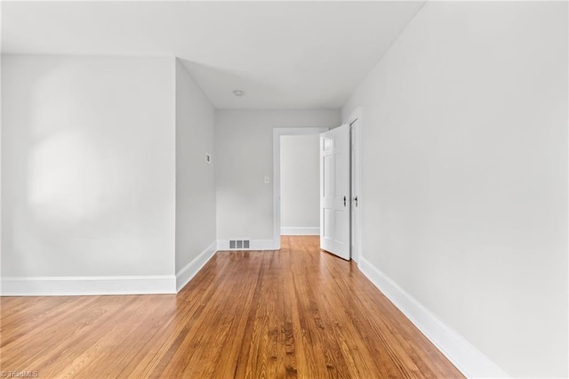 hall with light wood-type flooring