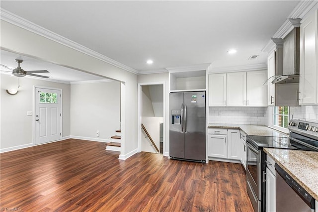 911 Chuppway Ct, Winston-Salem, NC 27106 - kitchen featuring appliances with stainless steel finishes, dark wood-style flooring, light stone countertops, decorative backsplash, and white cabinets
